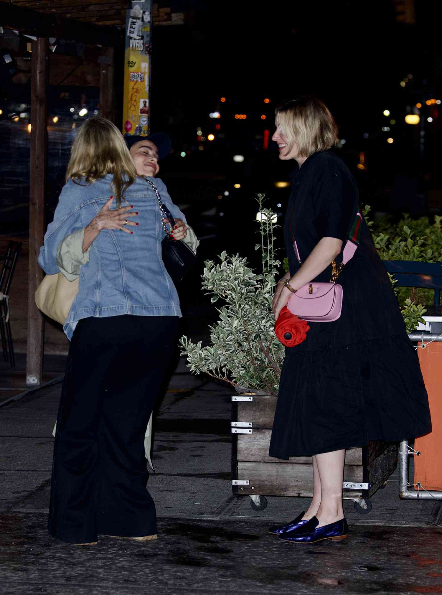 Taylor Swift looks stylish in long leather boots as she goes to dinner with Zoe Kravitz and Laura Dern
