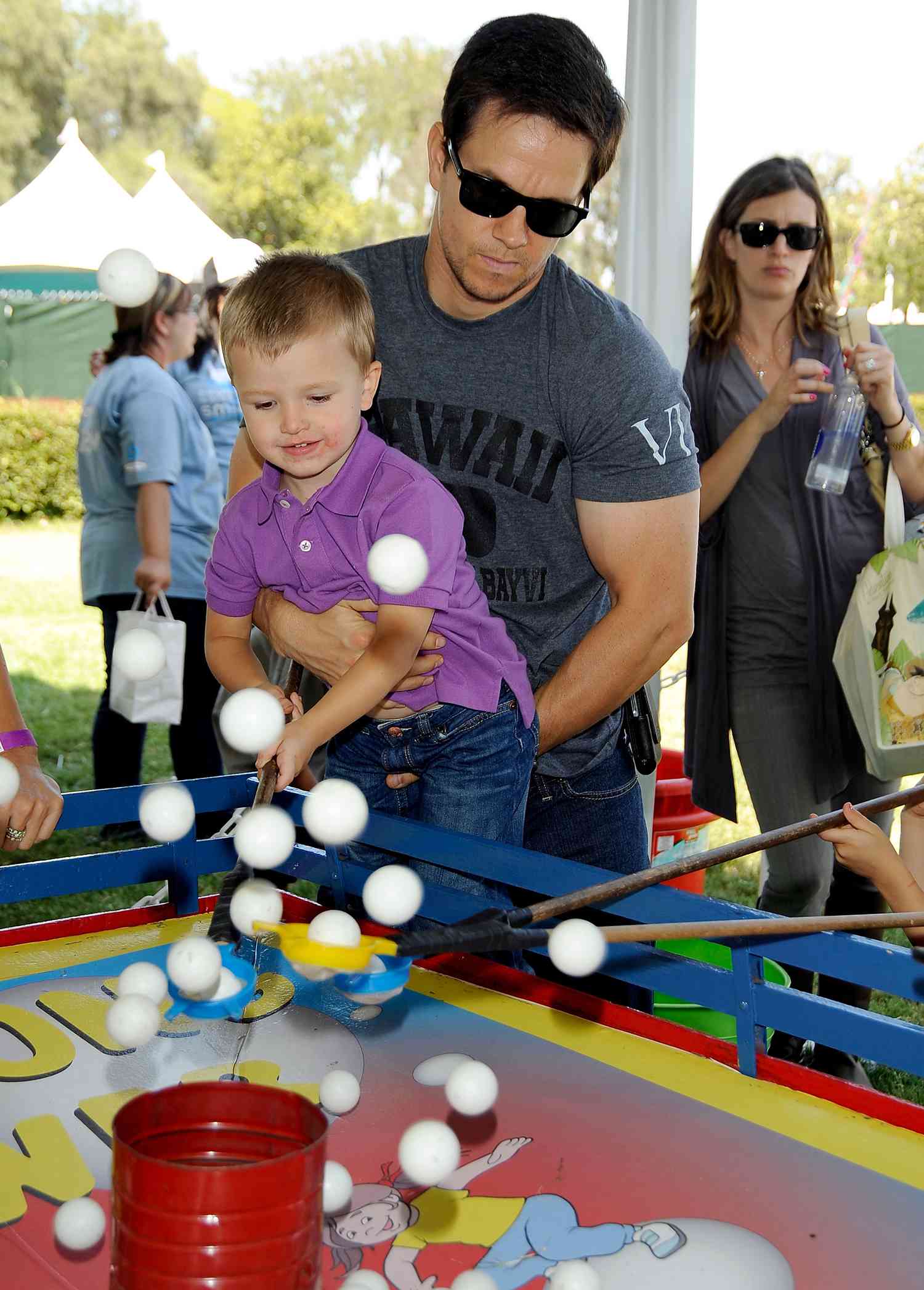 Mark Wahlberg and his son Michael attend A Time for Heroes Celebrity Carnival Sponsored by Disney, benefiting the Elizabeth Glaser Pediatric AIDS Foundation, held at Wadsworth Theatre 