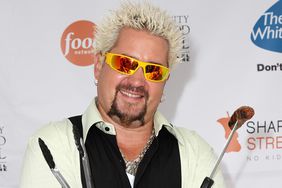 TV personality and Chef Guy Fieri attends a grill-off for the 2009 Food Network NYC Wine & Food Festival at the Norwegian Cruise Line Welcome Center at Pier 54 on October 9, 2009 in New York City.