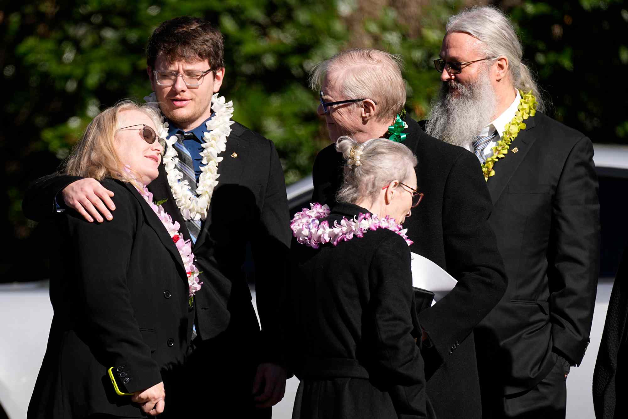 Amy Carter, left, and her husband John Joseph "Jay" Kelly, right, arrive for the funeral service for former first lady Rosalynn Carter at Maranatha Baptist Church, Wednesday, Nov. 29, 2023, in Plains, Ga. 