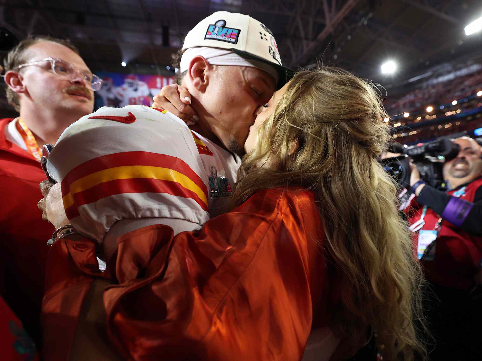 Patrick Mahomes #15 of the Kansas City Chiefs celebrates with his wife Brittany Mahomes after the Kansas City Chiefs beat the Philadelphia Eagles in Super Bowl LVII at State Farm Stadium on February 12, 2023 in Glendale, Arizona