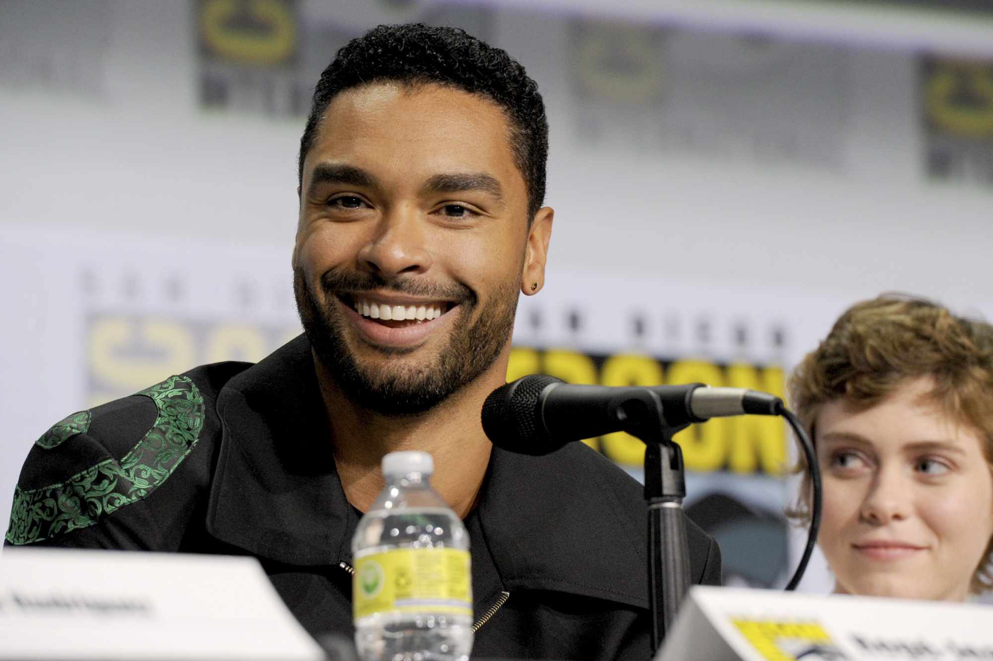 SAN DIEGO, CALIFORNIA - JULY 21: (L-R) Regé-Jean Page and Sophia Lillis speak onstage at the "Dungeons & Dragons: Honor Among Thieves" panel during 2022 Comic-Con International: San Diego at San Diego Convention Center on July 21, 2022 in San Diego, California. (Photo by Albert L. Ortega/Getty Images)