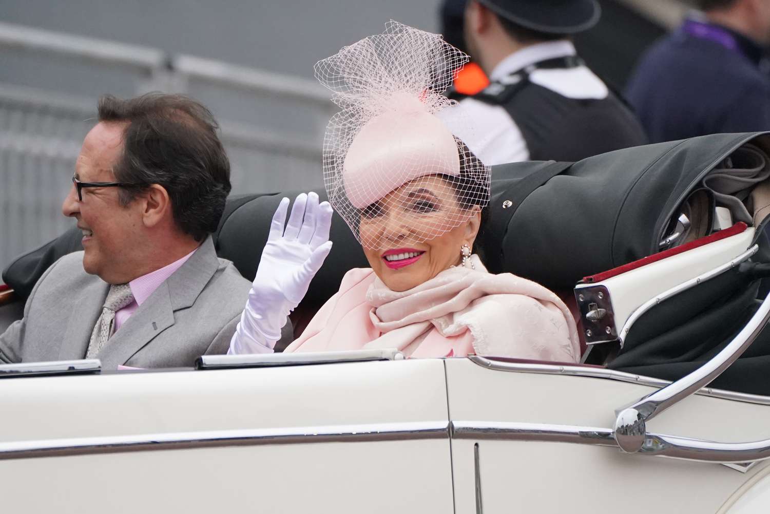 Actress Joan Collins and her husband Percy Gibson take part in the Platinum Jubilee Pageant in front of Buckingham Palace, on day four of the Platinum Jubilee celebrations, on June 05, 2022 in London, England.