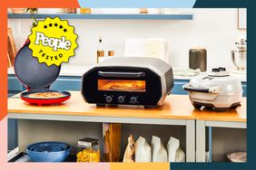 A variety of indoor pizza ovens we recommend on a kitchen countertop