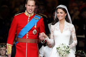 Prince William, Duke of Cambridge and Catherine, Duchess of Cambridge smile following their marriage at Westminster Abbey on April 29, 2011