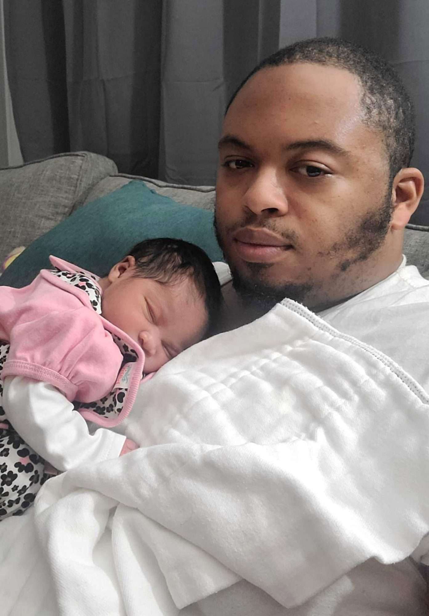 Davon Thomas with newborn daughter Devynn