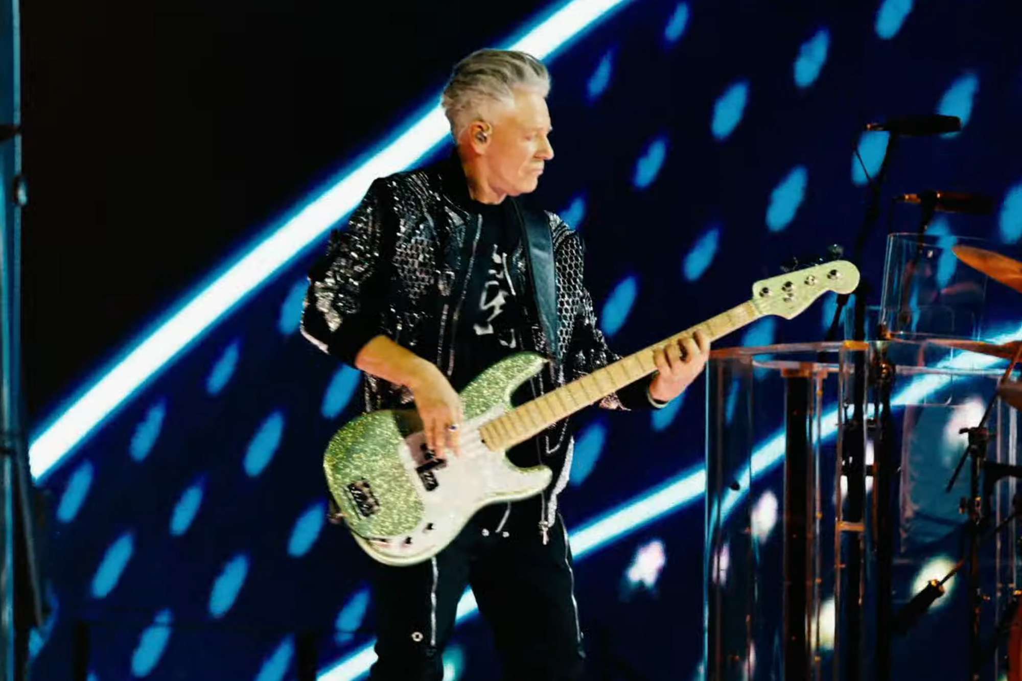 Adam Clayton of U2 performs at the 2024 Grammys