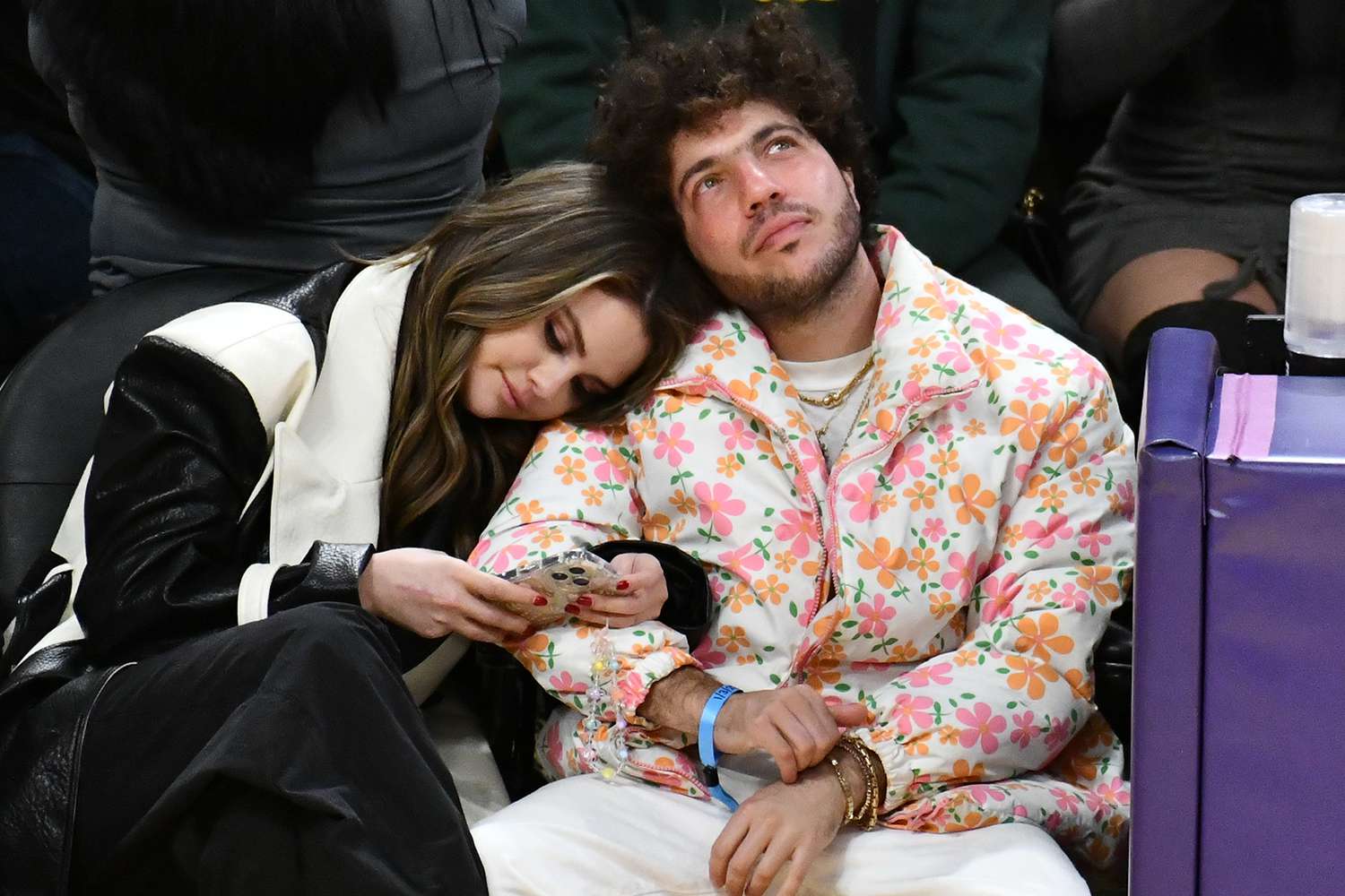 Selena Gomez and Benny Blanco attend a basketball game between the Los Angeles Lakers and the Miami Heat