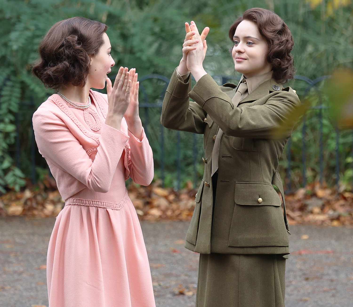 EXCLUSIVE: Hit Netflix series "The Crown" filming shows Queen Elizabeth (Viola Prettejohn) and Princess Margaret (Beau Gadsdon) Celebrating the morning after VE Day 8th May 1945 with a walk down the Mall