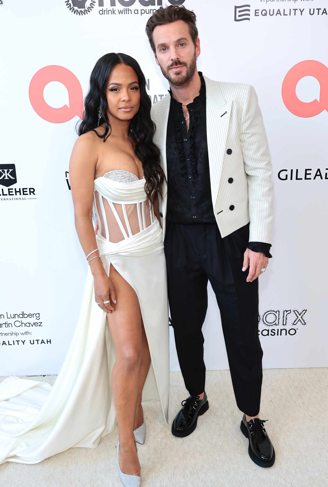 Christina Milian and Matt Pokora attend Elton John AIDS Foundation's 30th Annual Academy Awards Viewing Party on March 27, 2022 in West Hollywood, California.