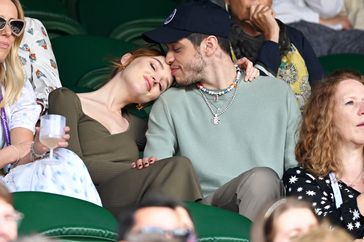 Phoebe Dynevor and Pete Davidson attend day 6 of the Wimbledon Tennis Championships at the All England Lawn Tennis and Croquet Club on July 03, 2021 in London, England.