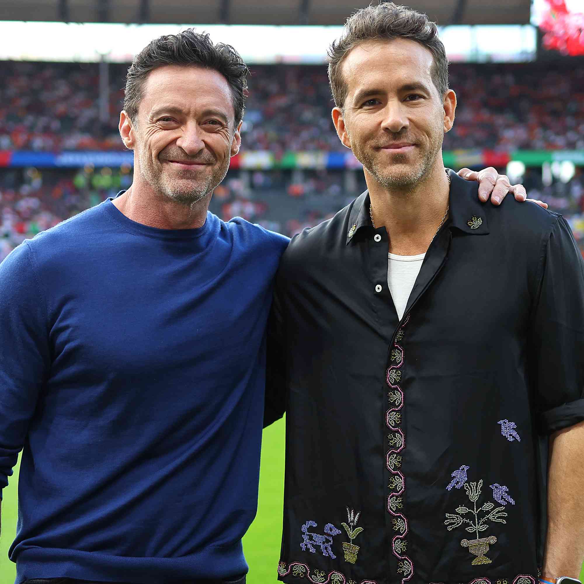 Hugh Jackman and Ryan Reynolds enjoy the pre match atmosphere prior to the UEFA EURO 2024 quarter-final match 