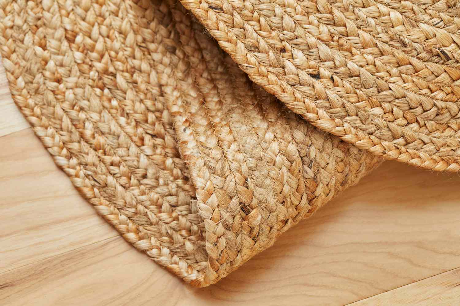 The nuLOOM Rigo Hand Woven Jute Area Rug is folded over