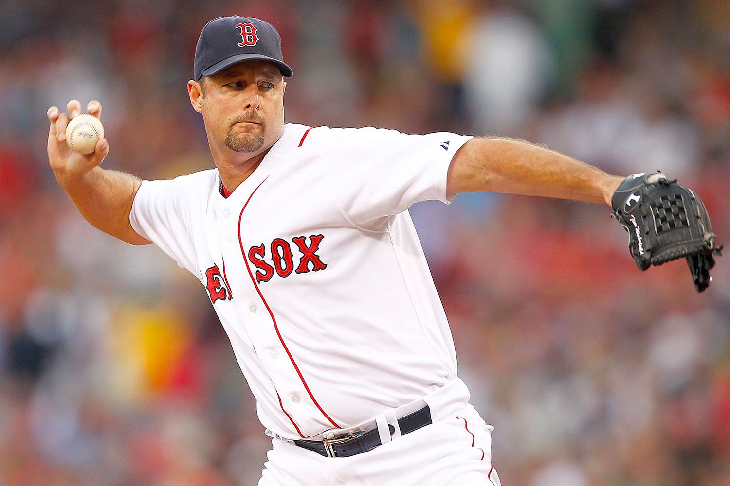 Tim Wakefield #49 of the Boston Red Sox throws against the Cleveland Indians at Fenway Park