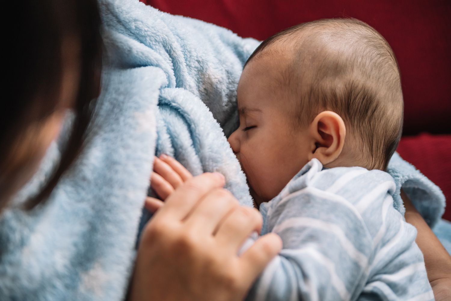 Mother breastfeeding her baby 