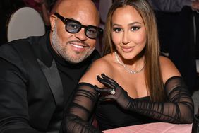 Israel Houghton and Adrienne Bailon attend the Elton John AIDS Foundation's 30th Annual Academy Awards Viewing Party