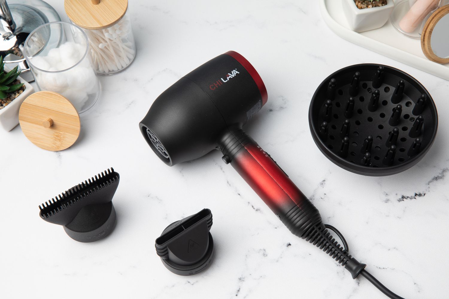 The CHI LAVA PRO Hair Dryer with attachments and brushes