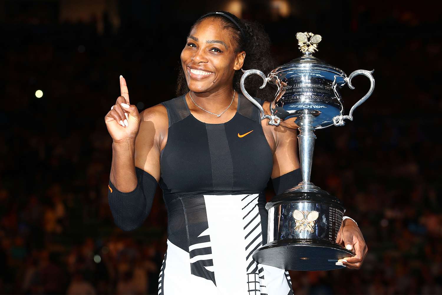 Serena Williams poses with the Daphne Akhurst Trophy after winning the Women's Singles Final against Venus Williams of the United States on day 13 of the 2017 Australian Open at Melbourne Park on January 28, 2017 in Melbourne, Australia.