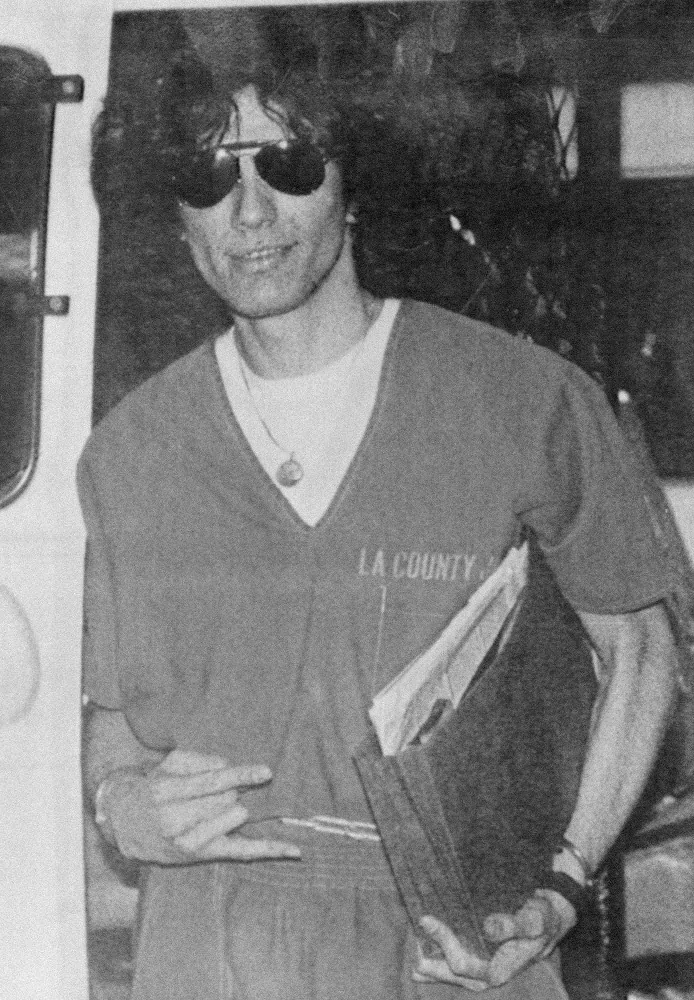 Richard Ramirez is led from the courthouse following his conviction.