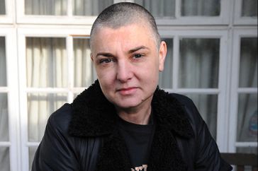 : Irish singer and song-writer Sinead O'Connor posed with a pet dog at her home in County Wicklow, Republic Of Ireland