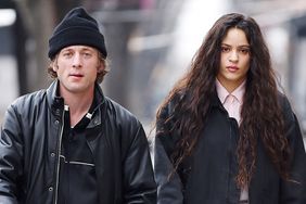 Jeremy Allen White and Rosalia keep close on a rare outing in New York City. 