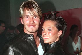 British footballer David Beckham and wife Victoria Beckham attend the Versace Store opening party on New Bond Street on June 11, 1999 in London.