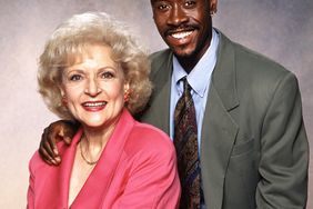 Betty White (as Rose Nylund) and Don Cheadle (as Roland Wilson) in the CBS situation comedy, THE GOLDEN PALACE.