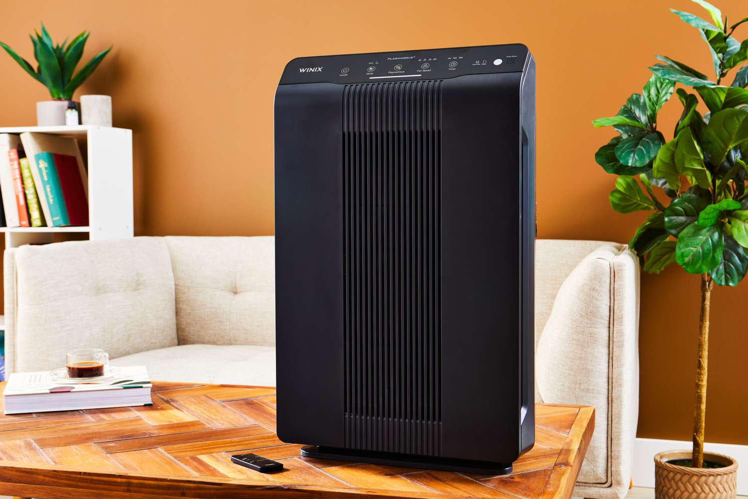 Winix 5500-2 4-Stage True HEPA Air Purifier displayed on wood table 