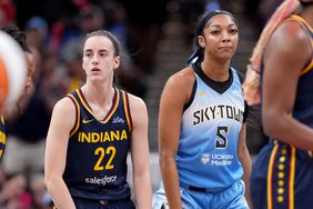 Caitlin Clark #22 of the Indiana Fever and Angel Reese #5 of the Chicago Sky look on during a game at Gainbridge Fieldhouse on June 16, 2024 in Indianapolis, Indiana.