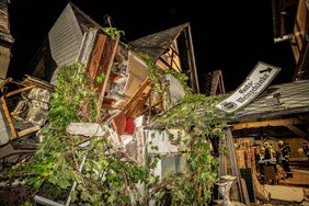 Debris are seen after the collapse of a hotel in Kroev, Germany Wednesday, Aug. 7, 2024