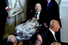 Former US President Jimmy Carter arrives for a tribute service for former US First Lady Rosalynn Carter, at Glenn Memorial Church in Atlanta, 