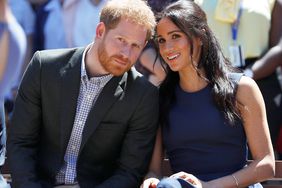 Prince Harry, Duke of Sussex and Meghan, Duchess of Sussex watch a performance during their visit to Macarthur Girls High School on October 19, 2018 in Sydney, Australia. The Duke and Duchess of Sussex are on their official 16-day Autumn tour visiting cities in Australia, Fiji, Tonga and New Zealand