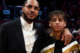 Carmelo Anthony poses with his son, Kiyan Carmelo Anthony during the 71st NBA All-Star Game as part of 2022 NBA All Star Weekend on February 20, 2022 at Wolstein Center in Cleveland, Ohio