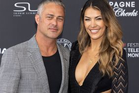 Taylor Kinney and Ashley Cruger attends the opening ceremony during the 61st Monte Carlo TV Festival on June 17, 2022.