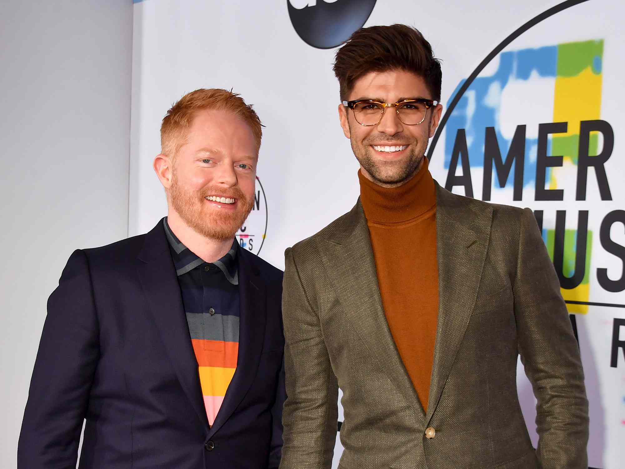 Jesse Tyler Ferguson (L) and Justin Mikita attends the 2017 American Music Awards at Microsoft Theater on November 19, 2017 in Los Angeles, California