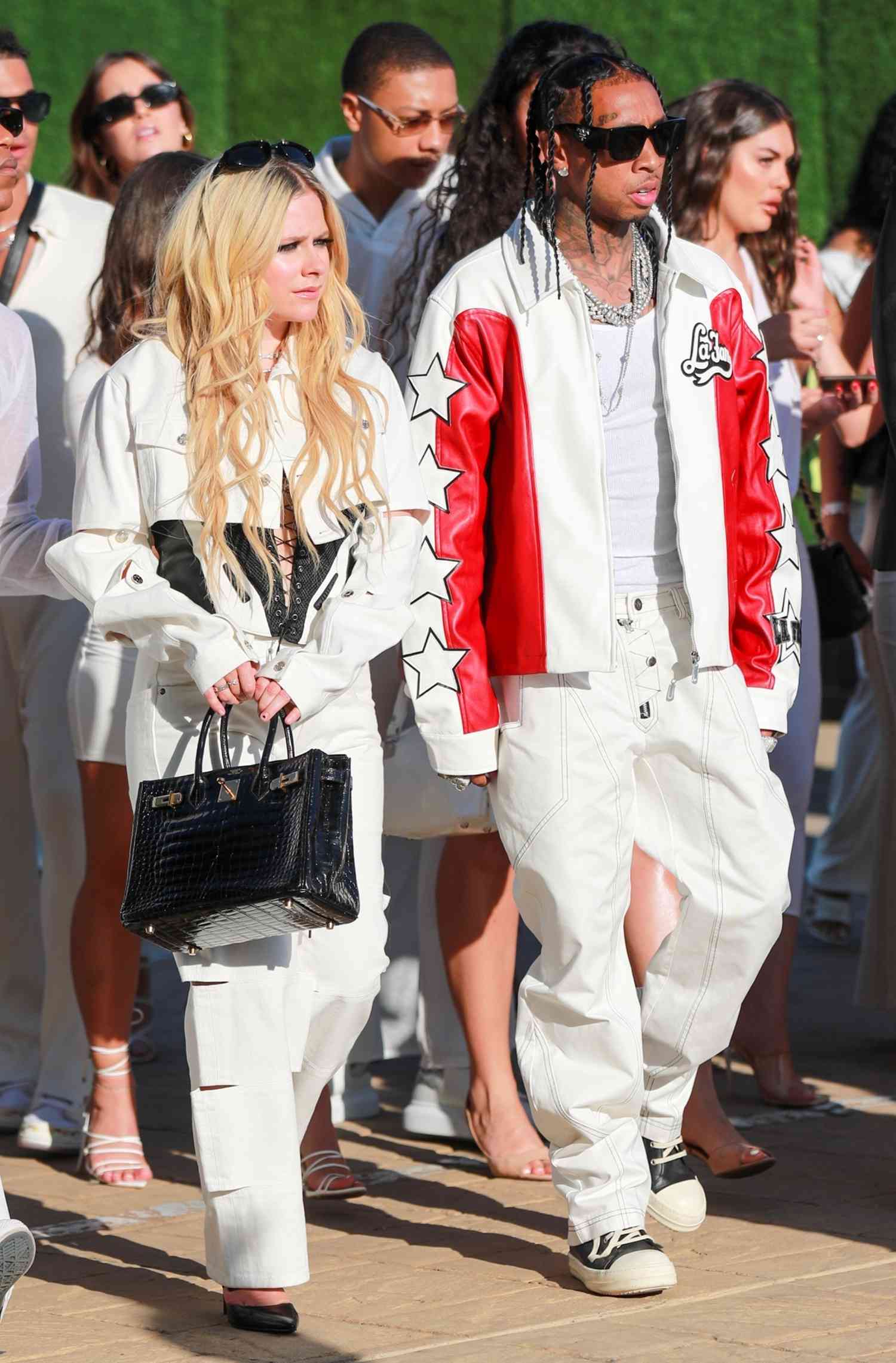 Avril Lavigne and Tyga arrive at Nobu âAll Whiteâ July 4th Party in Malibu