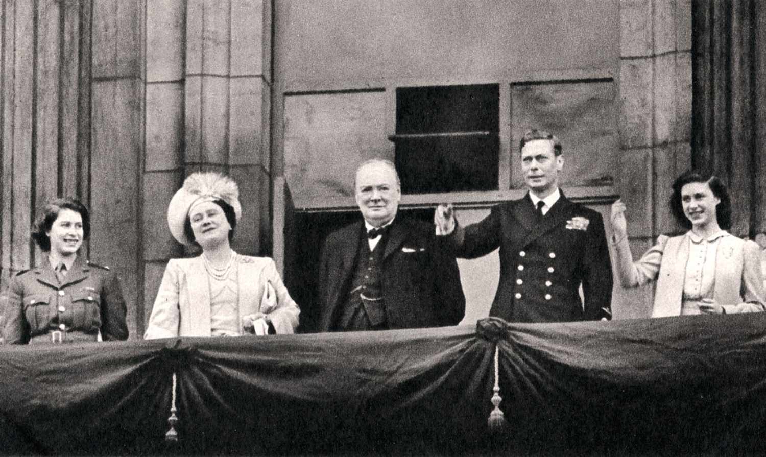 King George VI and the Queen with Princess Elizabeth, Princess Margaret and WinstonChurchill on the Balcony of Buckingham Palace on VE-Day, London, 8th May 1945