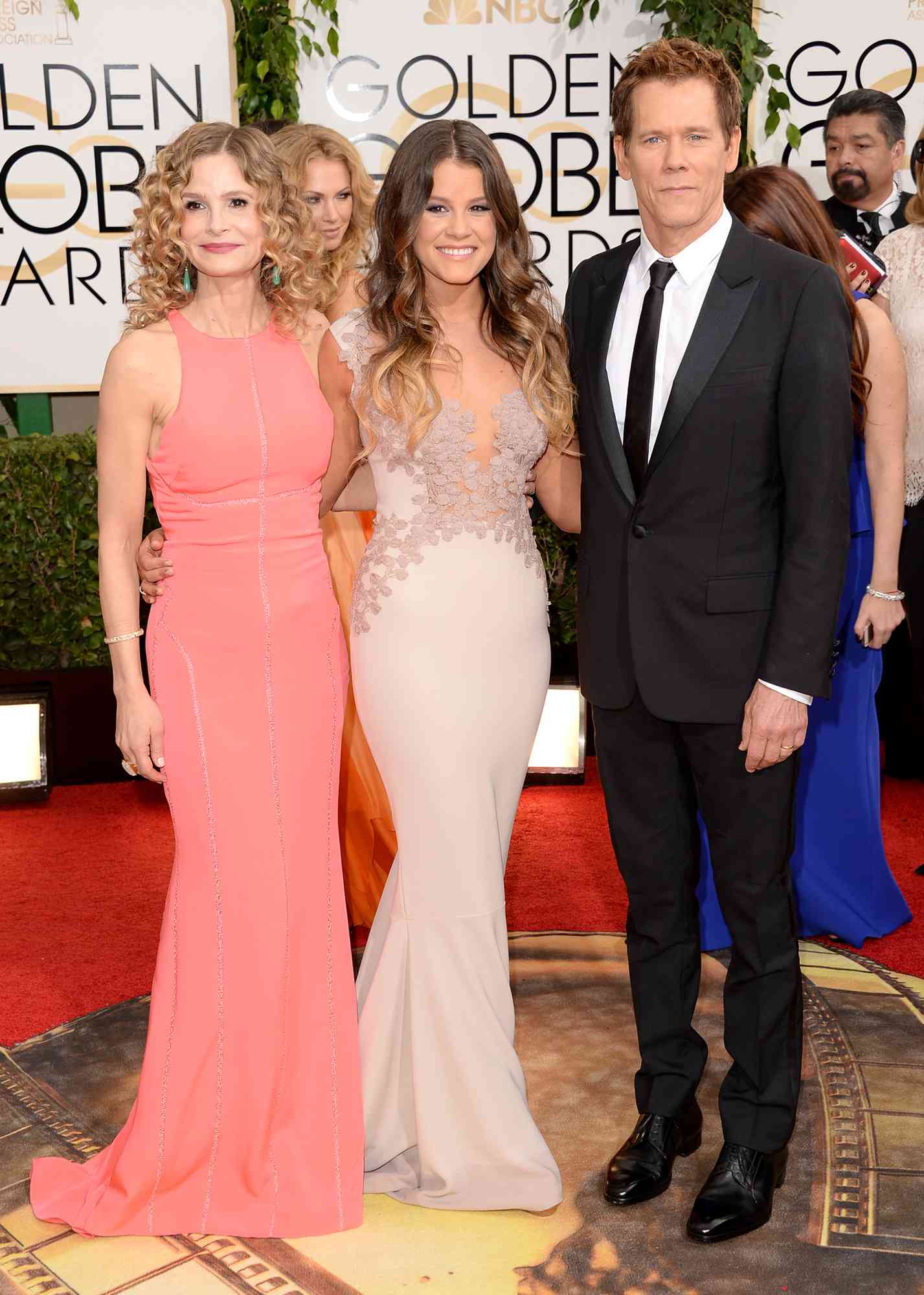 Kyra Sedgwick, Miss Golden Globe Sosie Bacon, and actor Kevin Bacon attend the 71st Annual Golden Globe Awards held at The Beverly Hilton Hotel on January 12, 2014 in Beverly Hills, California
