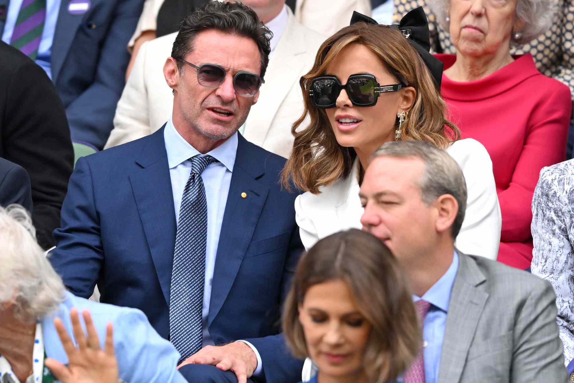 Hugh Jackman and Kate Beckinsale court-side of Centre Court on day thirteen of the Wimbledon Tennis Championships at the All England Lawn Tennis and Croquet Club on July 13, 2024 in London, England. 