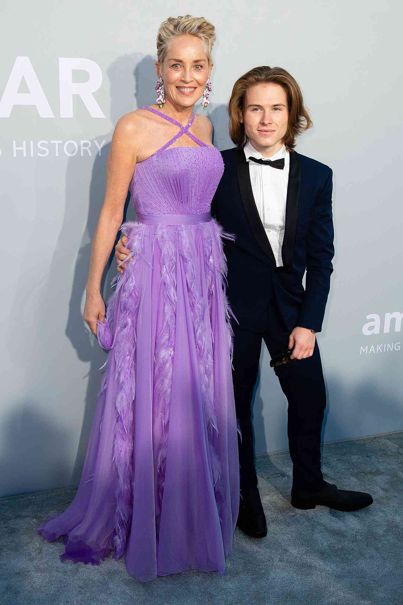 Sharon Stone and Roan Joseph Bronstein Stone attend the amfAR Cannes Gala 2021 during the 74th Annual Cannes Film Festival at Villa Eilenroc on July 16, 2021 in Cap d'Antibes, France. 