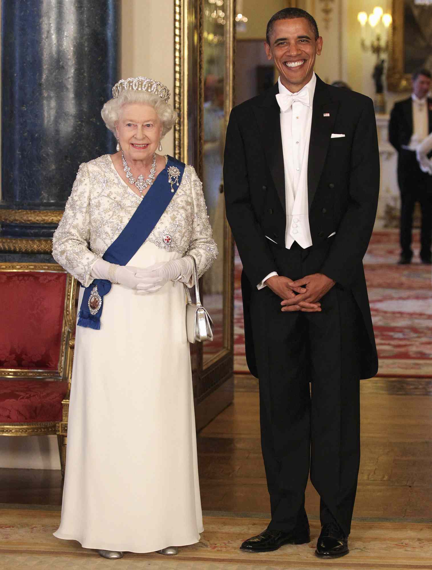 Queen Elizabeth II (L) and US President Barack Obama (R) pose in the Music Room of Buckingham Palace ahead of a State Banquet on May 24, 2011 in London, England.