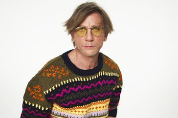 Daniel Craig is Almost Unrecognizable with Side Bangs and Grandpa Sweater in LoeweÃ¢ÂÂs New Campaign