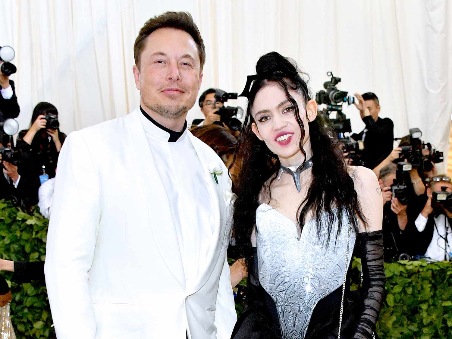 Elon Musk and Grimes attend the Heavenly Bodies: Fashion & The Catholic Imagination Costume Institute Gala at The Metropolitan Museum of Art on May 7, 2018 in New York City