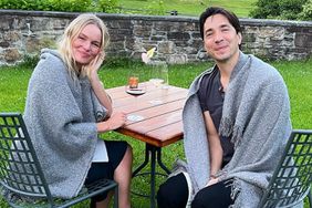 Kate Bosworth and Justin Long sit and enjoy wine on their upstate New York vacation