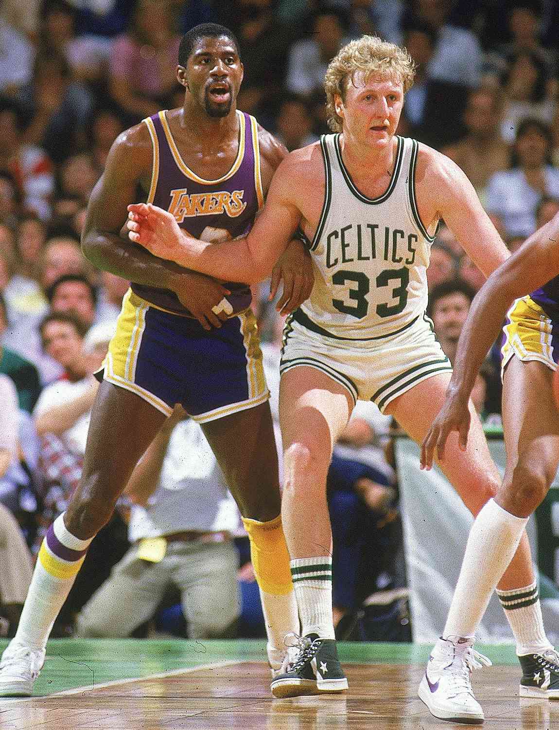 Los Angeles Lakers Magic Johnson (32) in action, fighting for position vs Boston Celtics Larry Bird (33), Boston, MA 5/27/1984
