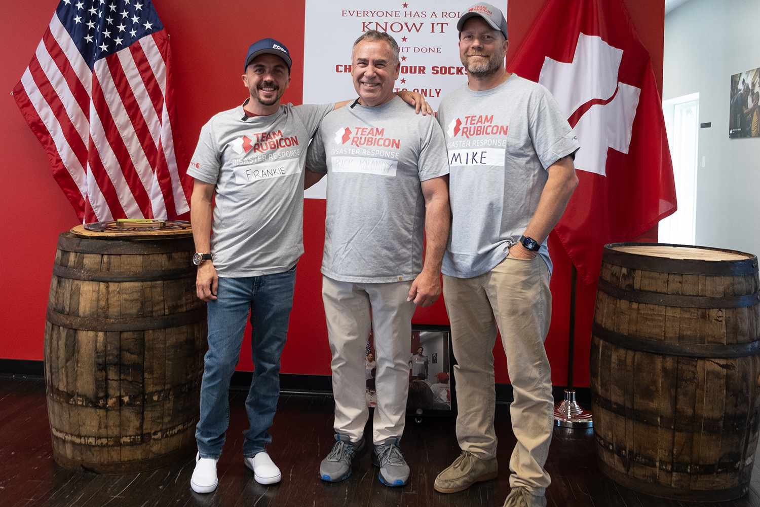 Actor and NASCAR driver Frankie Muniz meets volunteers from veteran-led humanitarian organization Team Rubicon ahead of the NASCAR Chicago Street Race in Chicago, IL on July 5. 