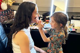 Alanis Morissette gets her makeup done by her daughter