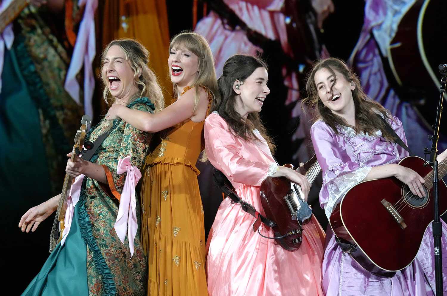 SANTA CLARA, CALIFORNIA - JULY 28: EDITORIAL USE ONLY Este Haim, Taylor Swift, Danielle Haim and Alana Haim perform onstage during Taylor Swift | The Eras Tour at Levi's Stadium on July 28, 2023 in Santa Clara, California.