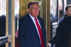 Former US President Donald Trump departs Trump Tower for Manhattan Criminal Court, to attend the first day of his trial for allegedly covering up hush money payments linked to extramarital affairs, in New York City on April 15, 2024. 