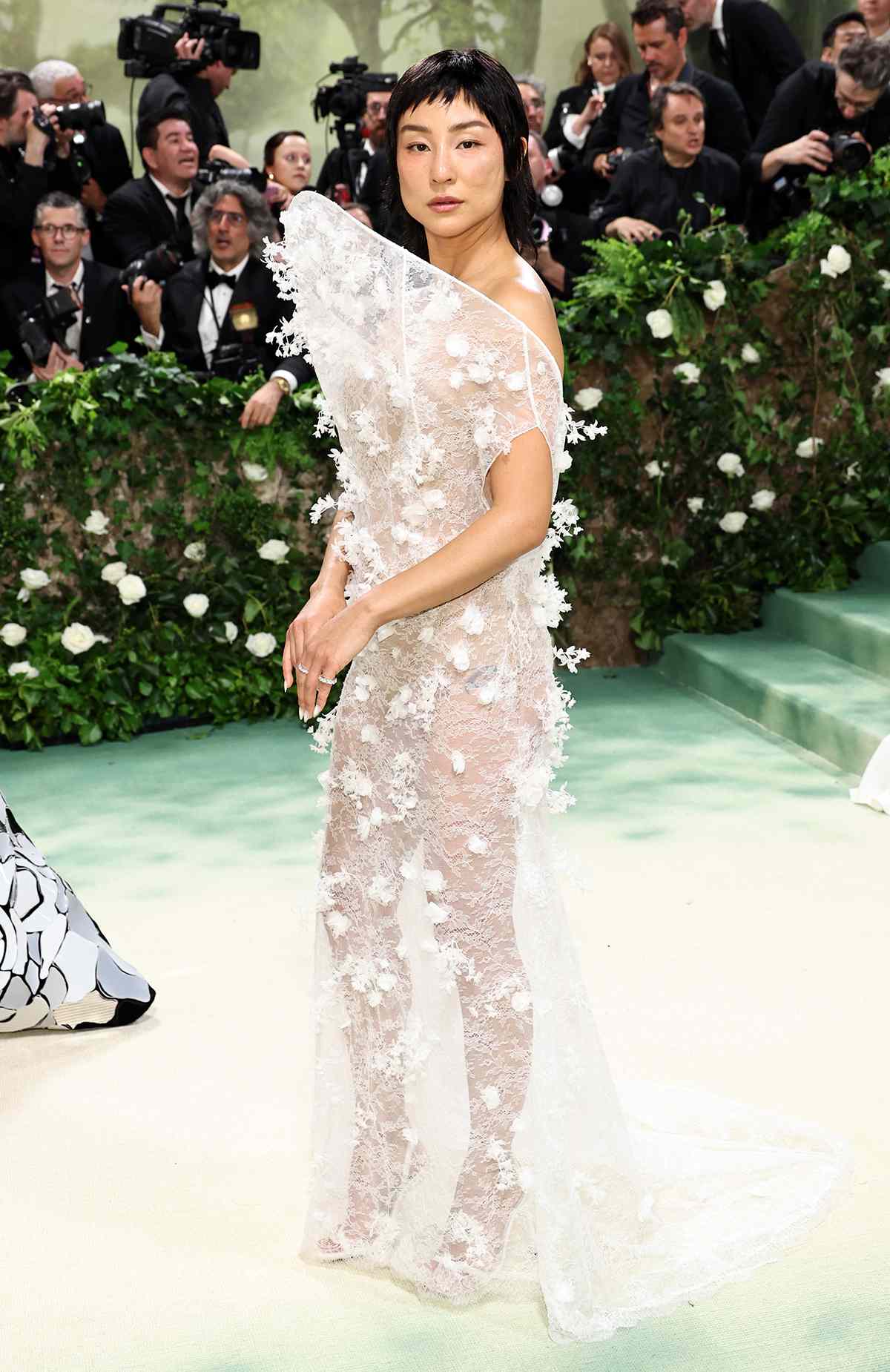 Greta Lee attends The 2024 Met Gala Celebrating "Sleeping Beauties: Reawakening Fashion" at The Metropolitan Museum of Art on May 06, 2024 in New York City. 